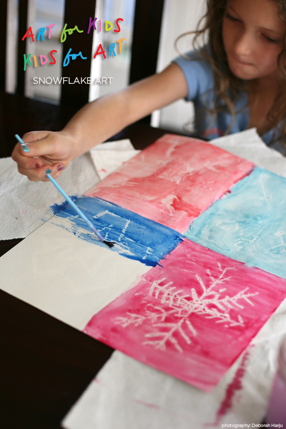 snowflake art project using crayon resist and watercolors